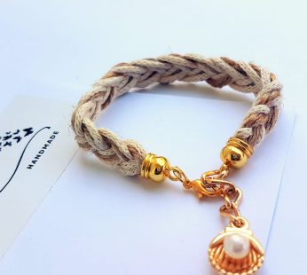 Bracelet “Pearl”. It is made in the form of braid
